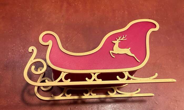 Press the small reindeer into the holes on the sides